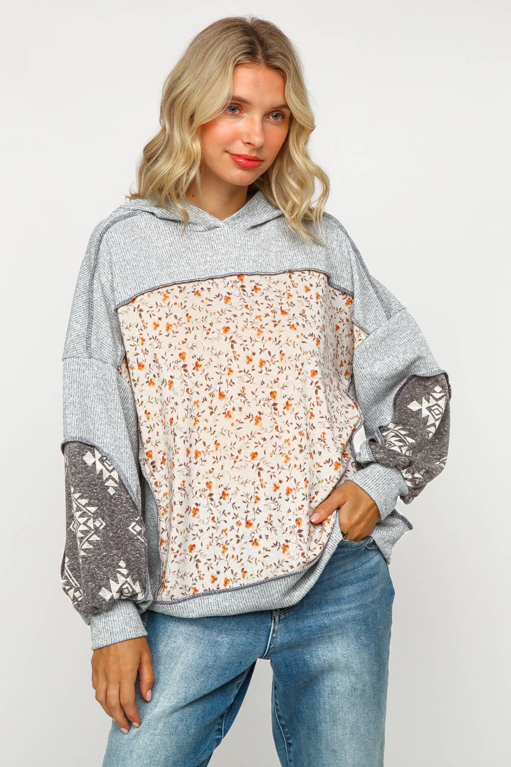 TWO TONE HACCI FLORAL KNIT TOP WITH HOOD