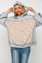 TWO TONE HACCI FLORAL KNIT TOP WITH HOOD