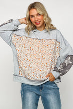 TWO TONE HACCI FLORAL KNIT TOP WITH HOOD