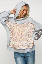 TWO TONE HACCI FLORAL KNIT TOP WITH HOOD